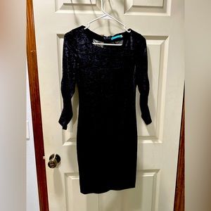 Little black dress fun peekaboo in the back.